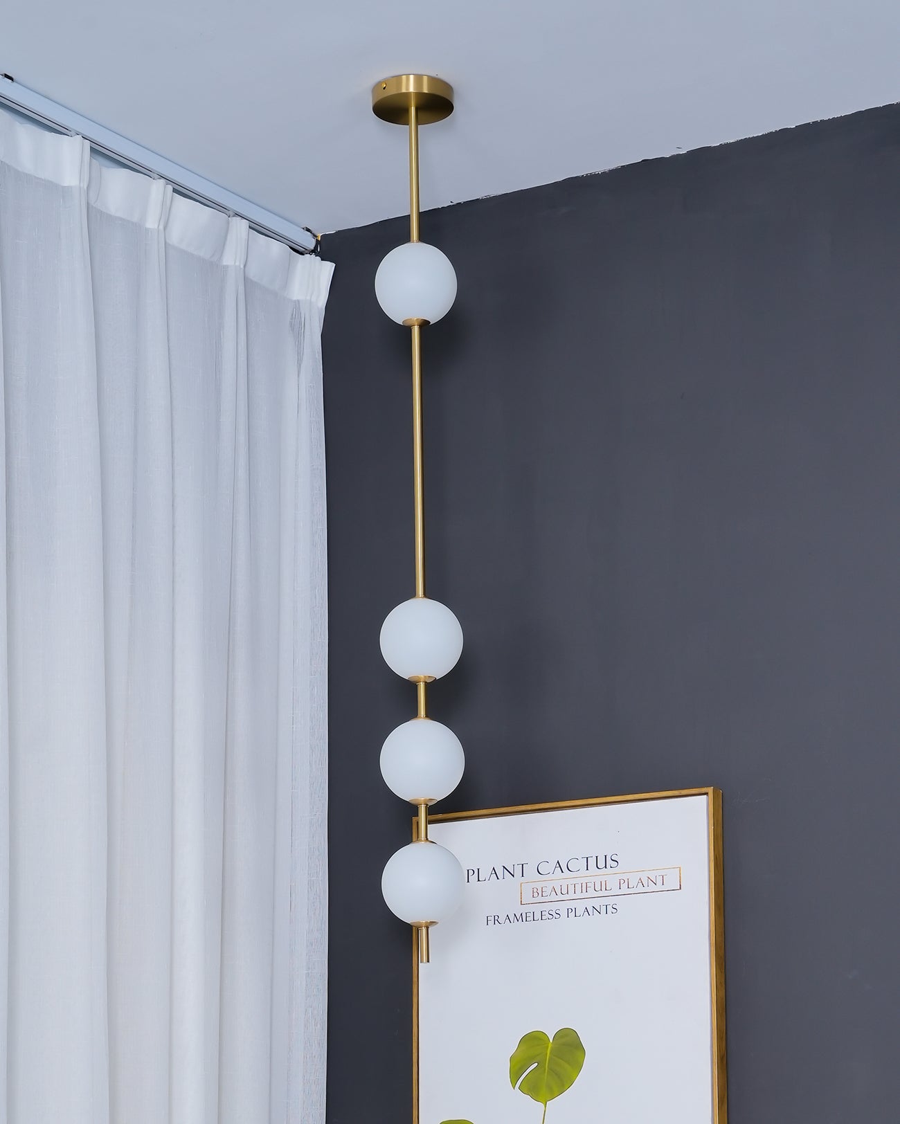 VERTICAL ORBITAL PENDANT LIGHT